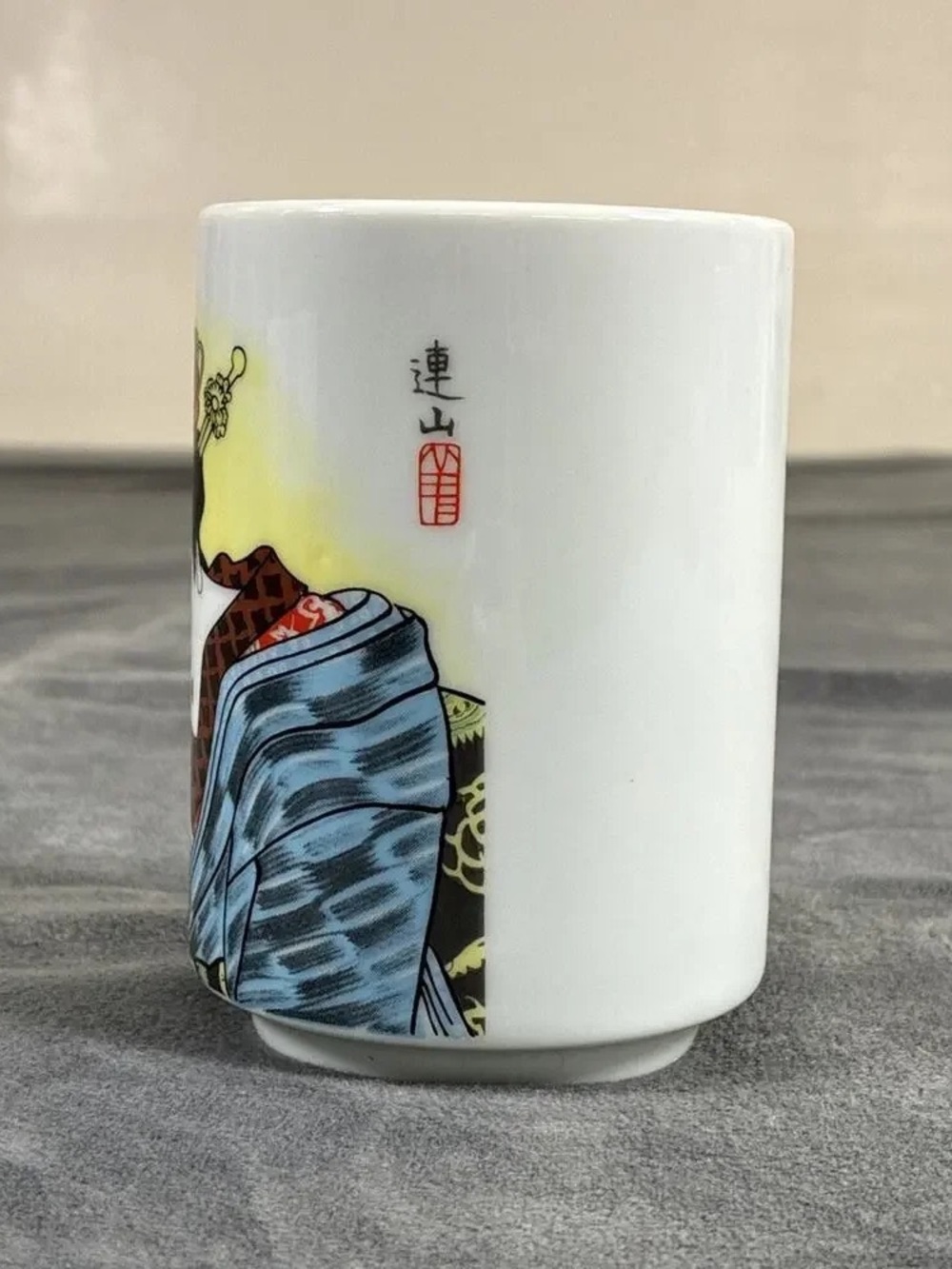 Porcelain Art Tumbler with Blue Robe Motif